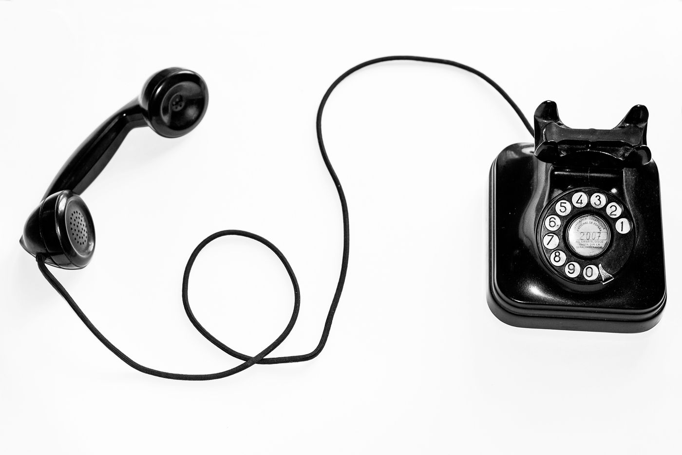 Classic telephone on a white desk