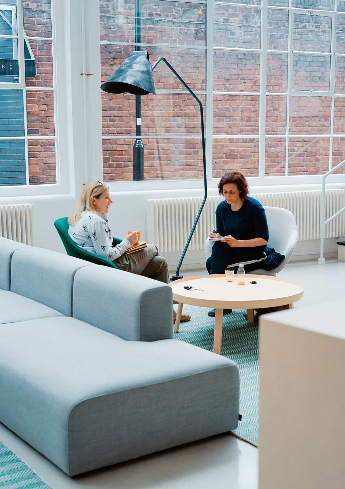 Bright coworking lounge representing the Affpinions team